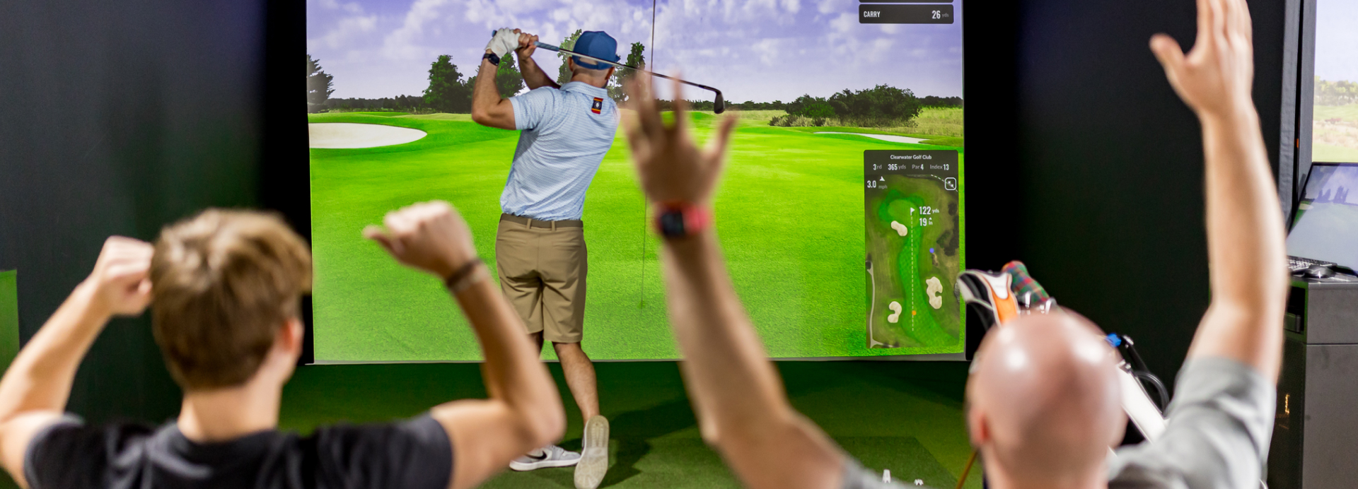 Golf Simulation Facility San Antonio: Fairway. People having fun and celebrating.